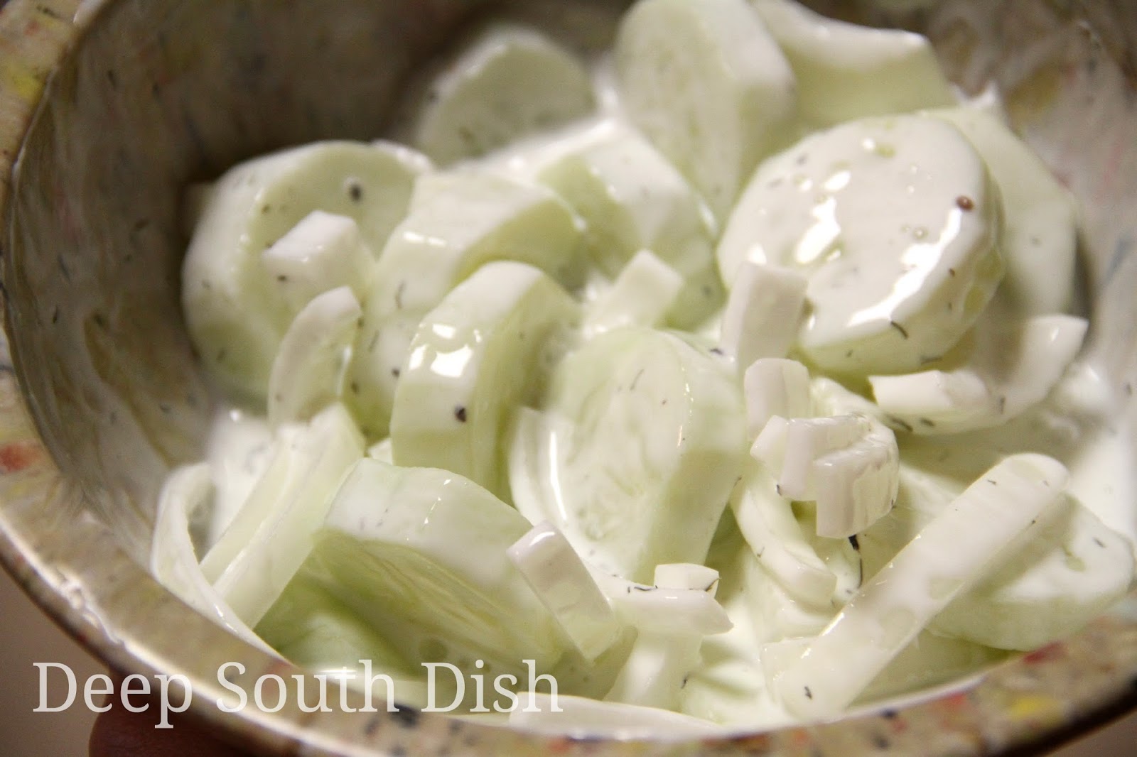 What are some recipes involving cucumber, onions and sour cream?